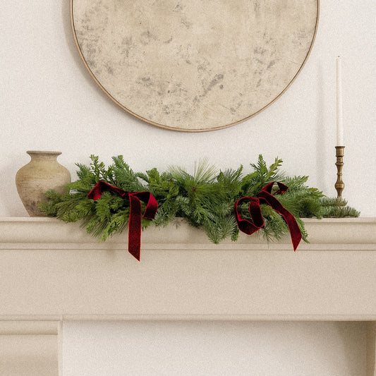 Fresh Evergreens Winter Bows Centerpiece