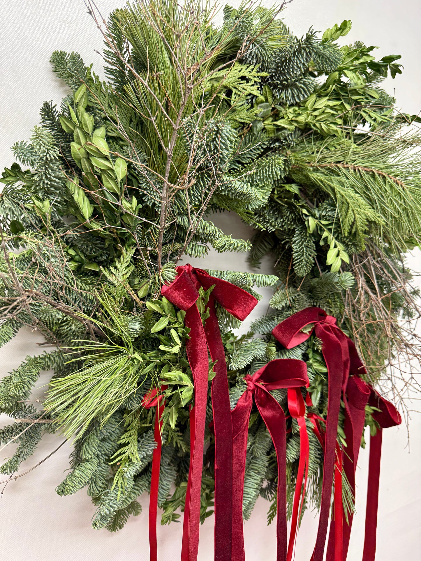 Fresh Evergreens Trailing Bows Wreath