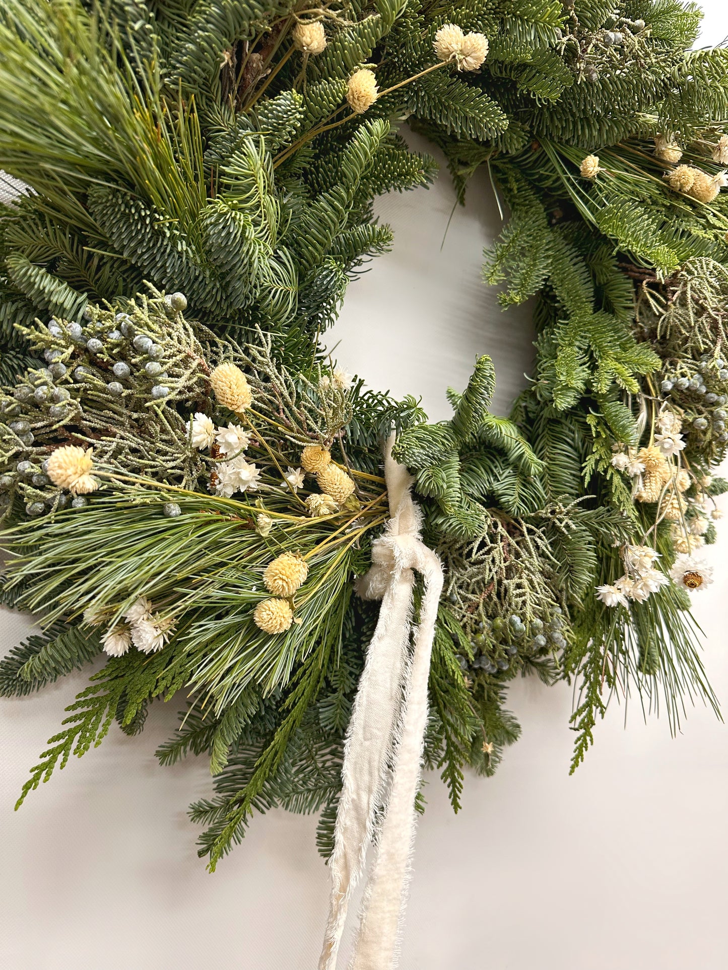 Fresh Evergreens and Ivory Draped Ribbon Wreath