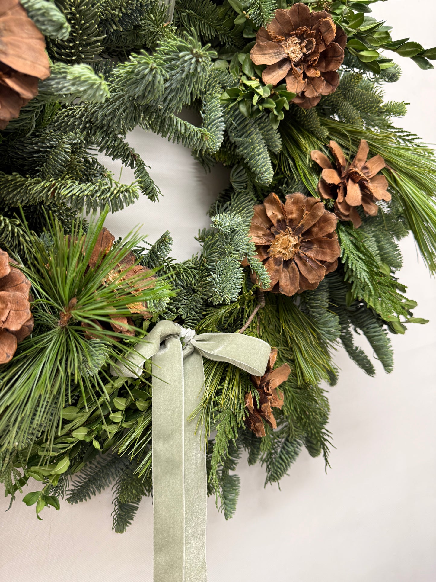 Fresh Evergreens Velvet Rosette Wreath