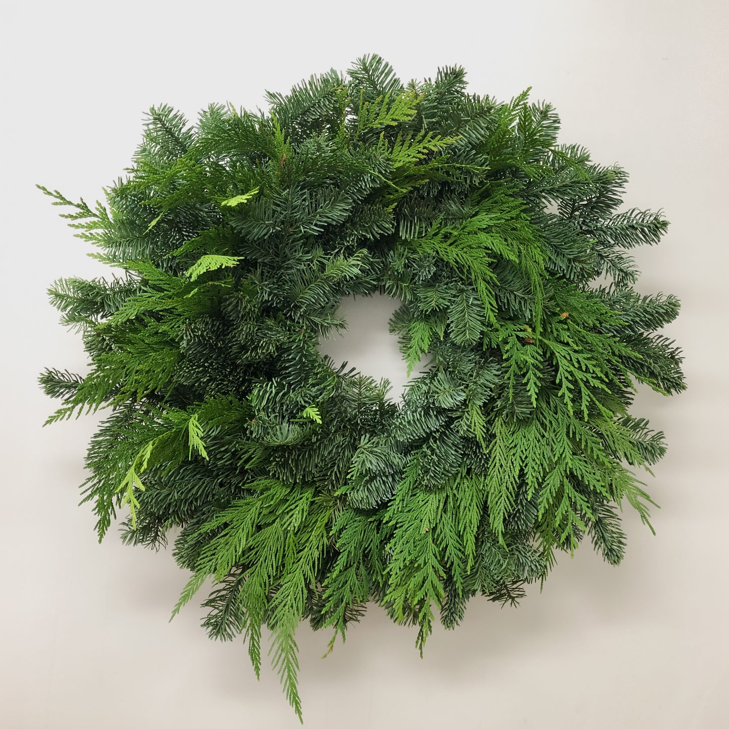 Fresh Evergreens Draping Cedar Wreath
